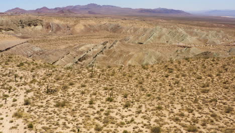 Flying-towards-and-looking-down-into-one-of-the-deep-geological-valleys-that-form-the-Rainbow-Basin-in-the-Mojave-Desert