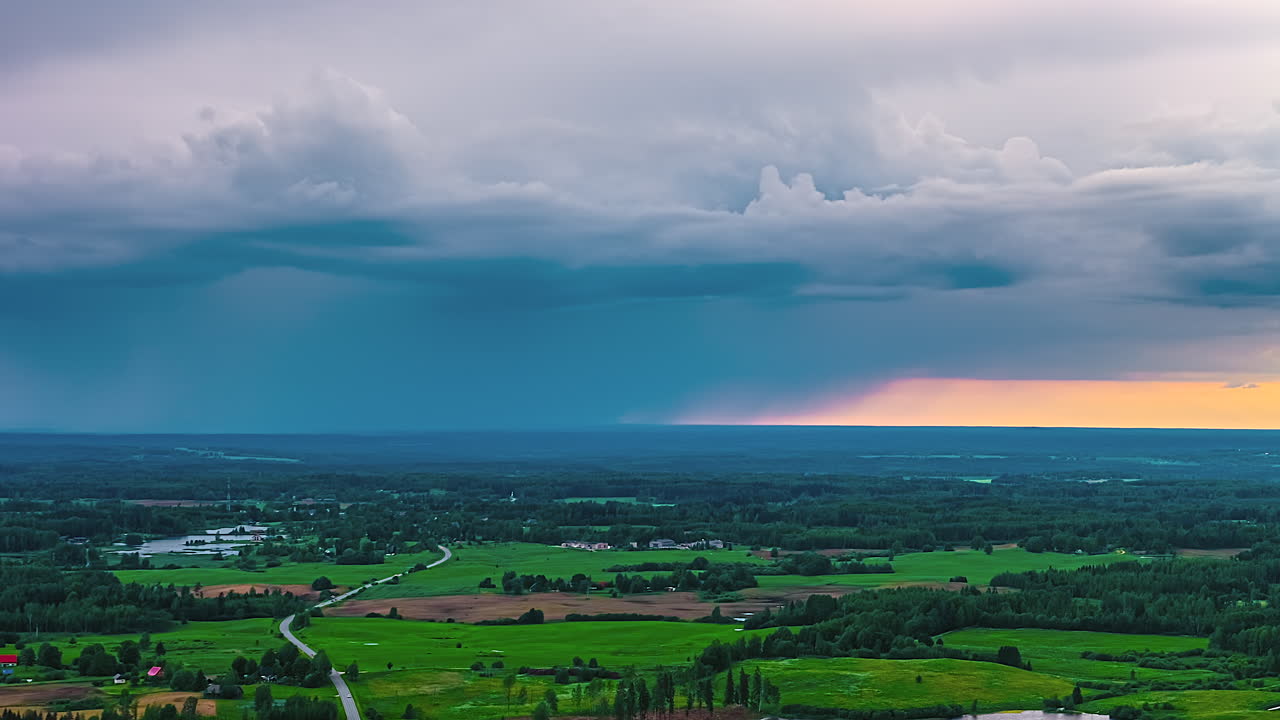 Vibrant horizon with stormy clouds, sunset timelapse, peaceful scene