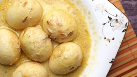 Top-view-of-egg-curry-in-a-bowl-on-table