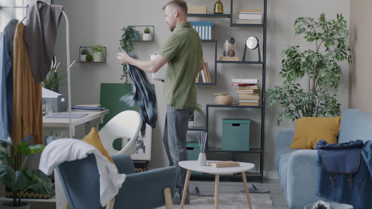 Man Doing Laundry at Home