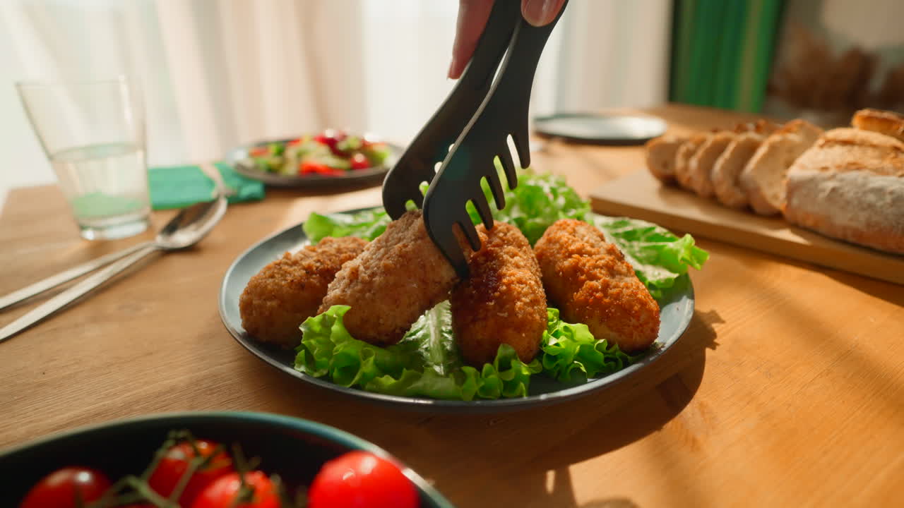 Delicious Fried Meatballs Served with Salad and Bread