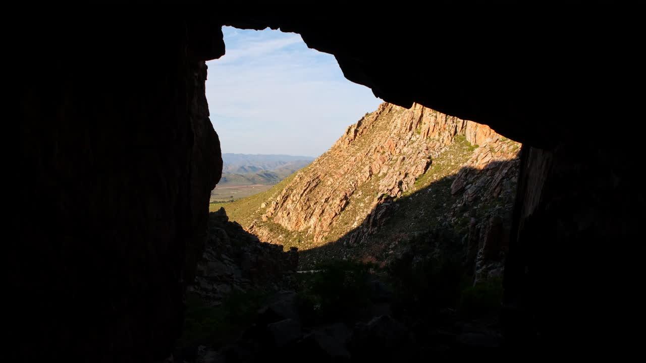 View from dark Montagu Guano Cave of surrounding jagged Langeberg mountains