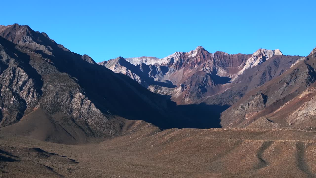 Mammoth Lakes Crowley aerial drone California circle right motion rugged mountains Convict Canyon Mount Morrison Morgan Sierra Nevadas Range PCT Trail Bishop Toms Trail blue sky morning