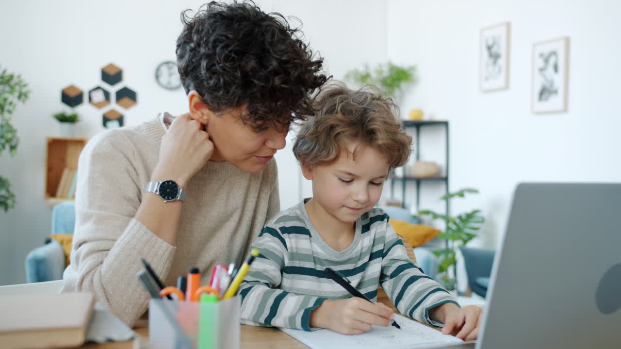 Mother and Child Doing Homework Together