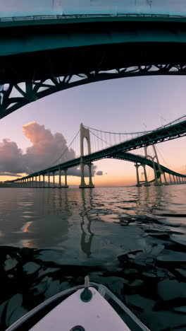 newport bridge at golden hour from the water