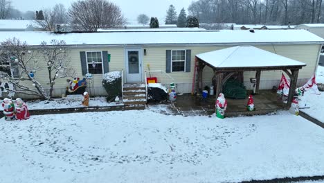 holiday christmas decorations on mobile home trailer house in rural appalachia usa