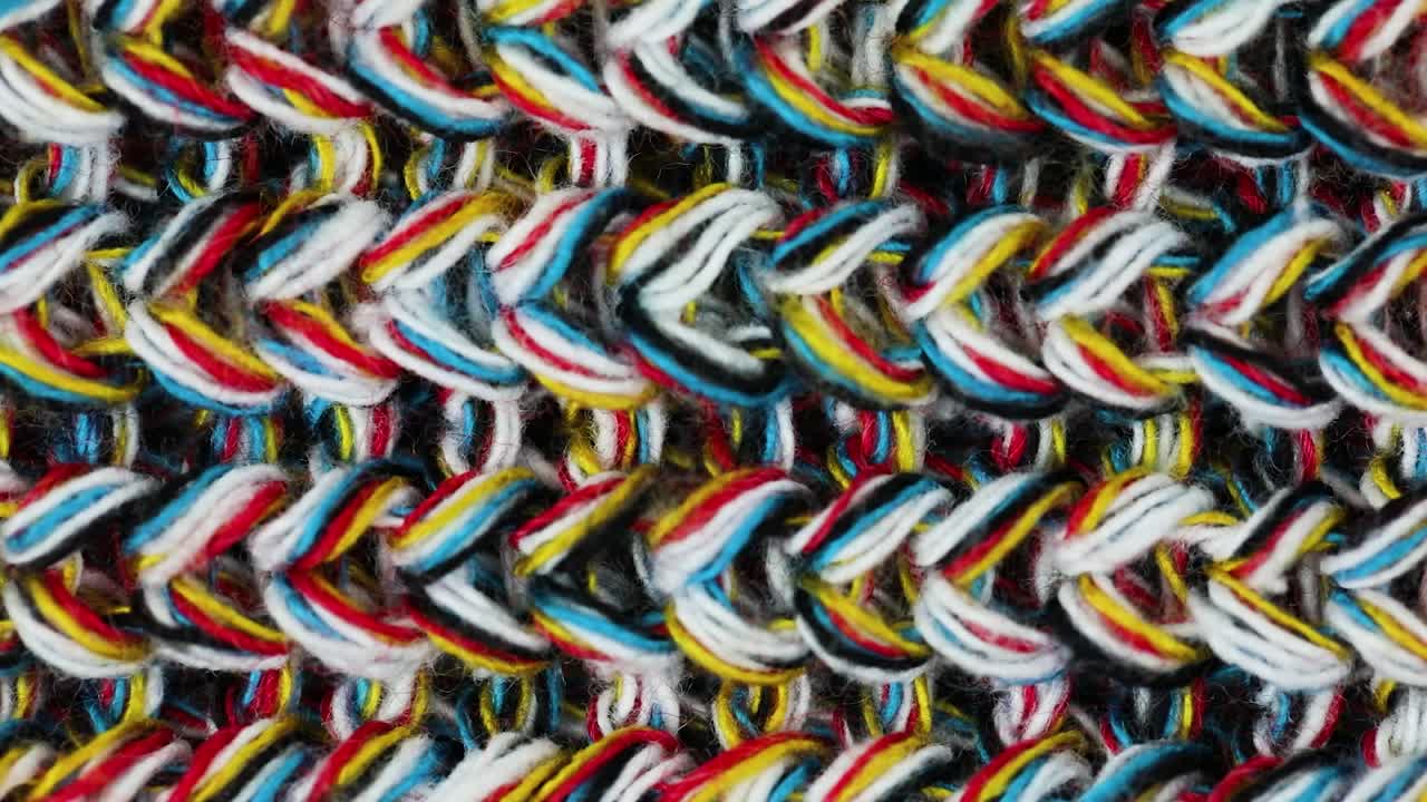 화려한 니트 양모 직물의 근접 촬영 보기