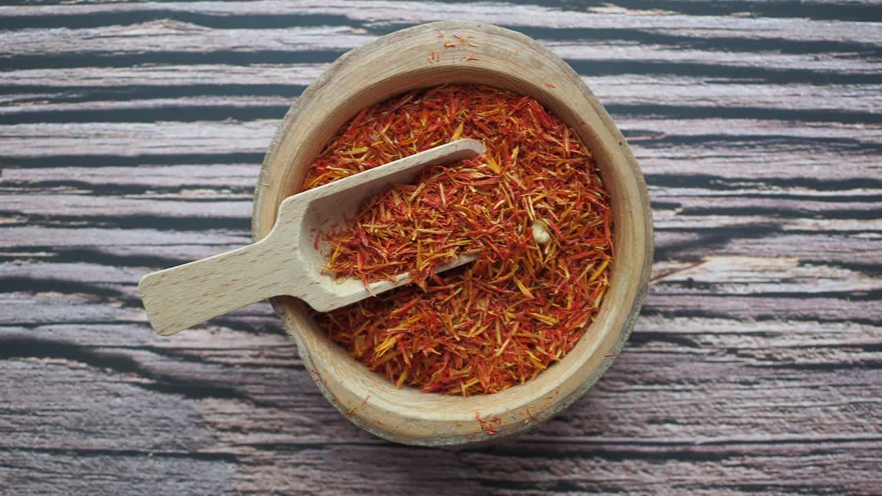 Dried Saffron in a Wooden Bowl