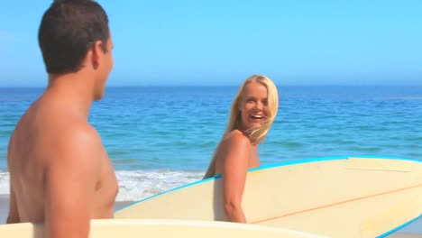 couple going surfing