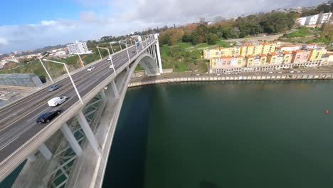 epic fpv drone fast bridge flyover cars crossing arrabida bridge porto portugal