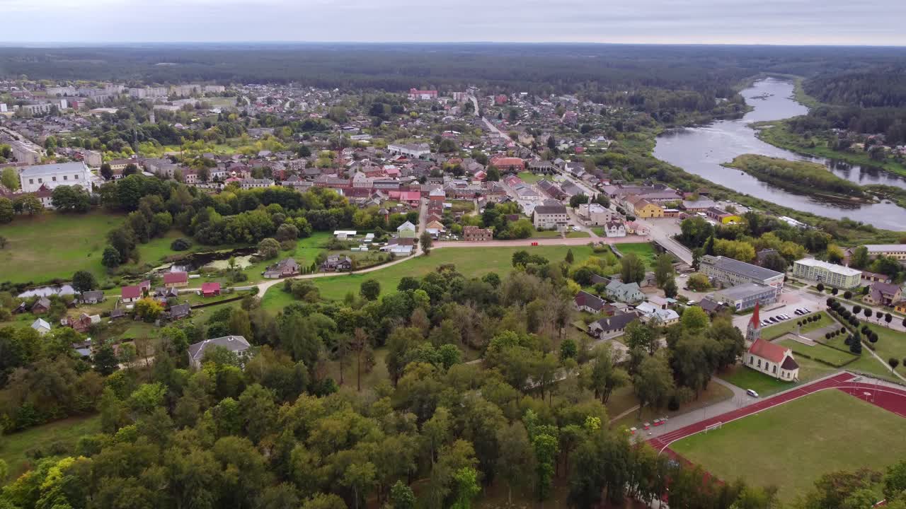 Scenic aerial view of Kraslava, Latvia with Kraslava Lutheran Church and surrounding nature