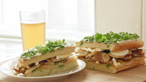 A-beautiful-shot-of-sandwich-and-a-beer-in-a-kitchen