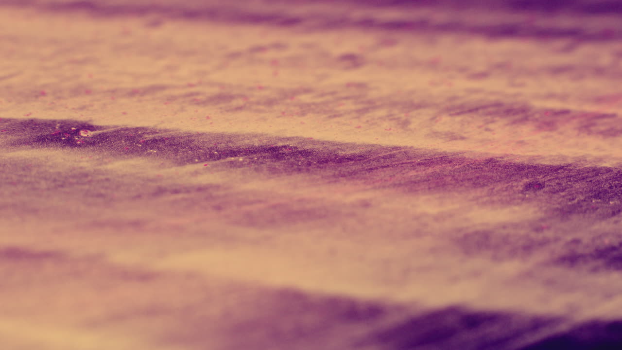 Colourful, organic, liquids macro shots buzzing and flowing