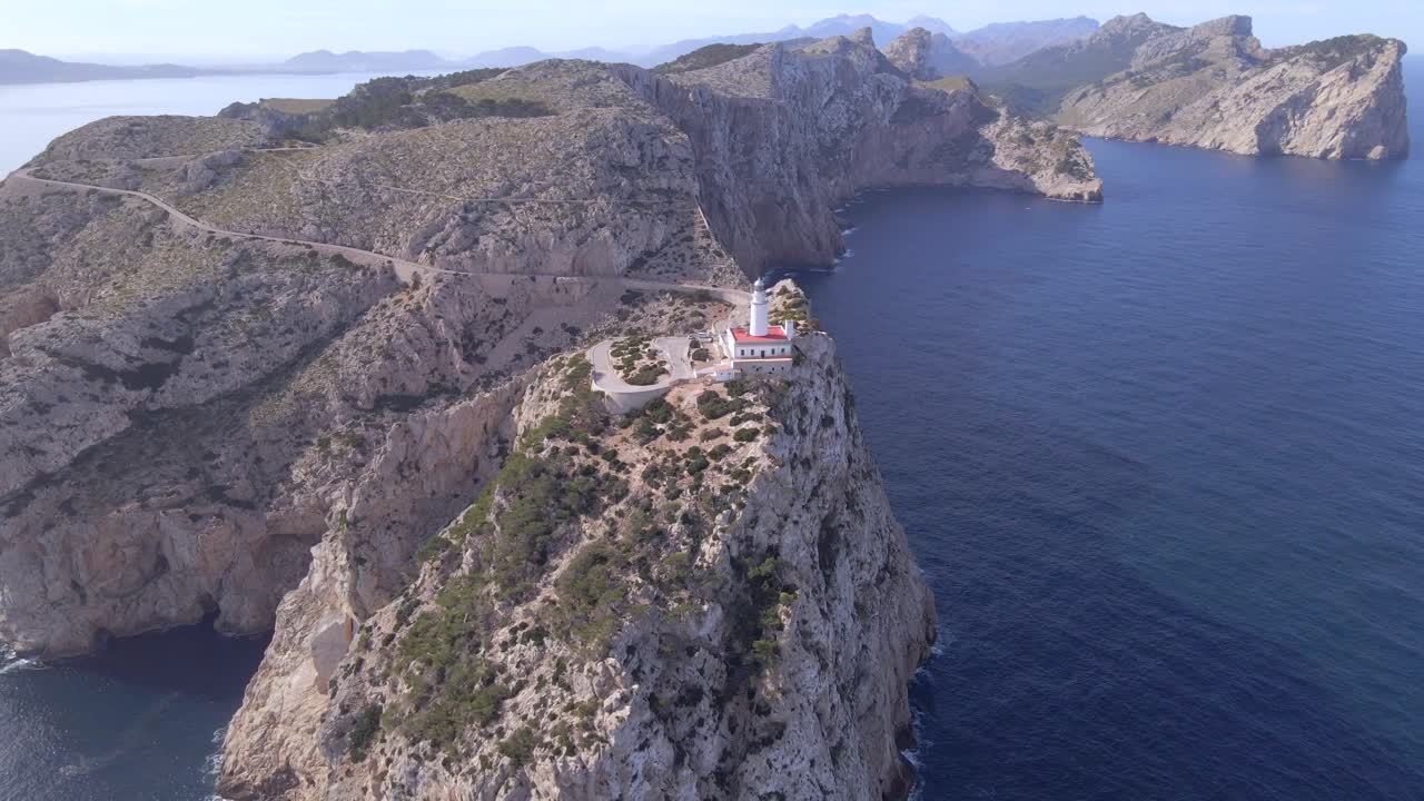 Explore the breathtaking landscape of Cap Formentor, featuring the iconic Faro de Formentor lighthouse perched on rugged cliffs. Experience the beauty of Mallorca's coastline.