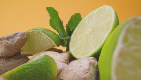 Sliced-lime-with-fresh-mint-and-ginger-root