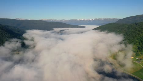 aerial footage beautiful nature norway over the clouds.