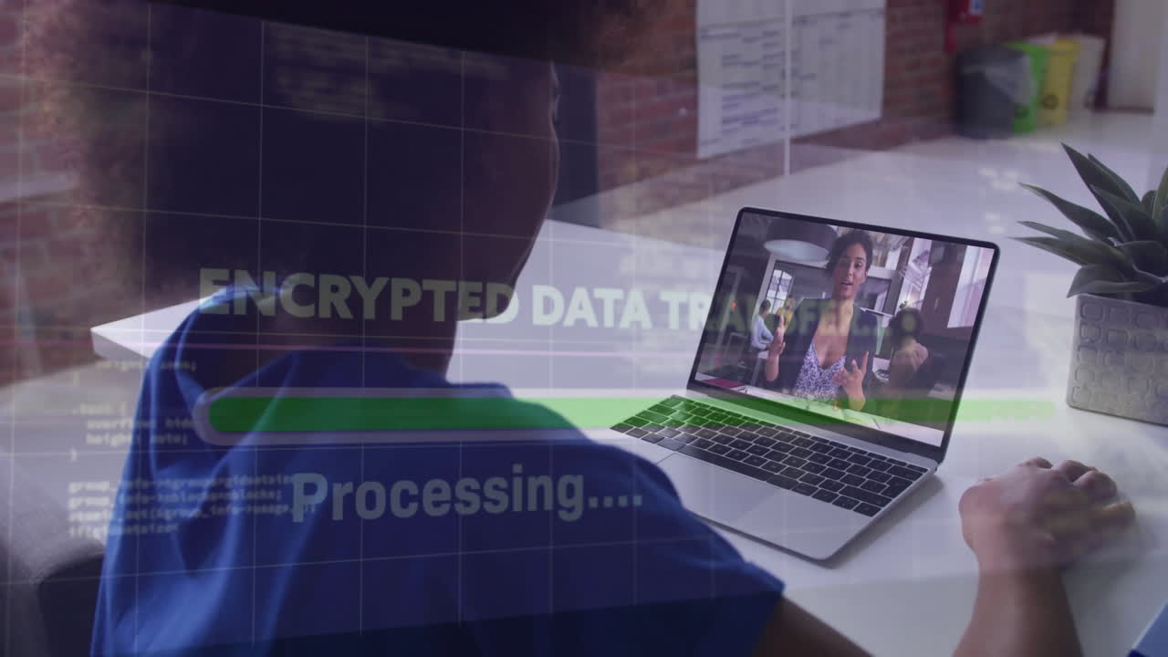 Person watching video on laptop with encrypted data transfer animation overlay