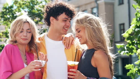 friends enjoying drinks outdoors