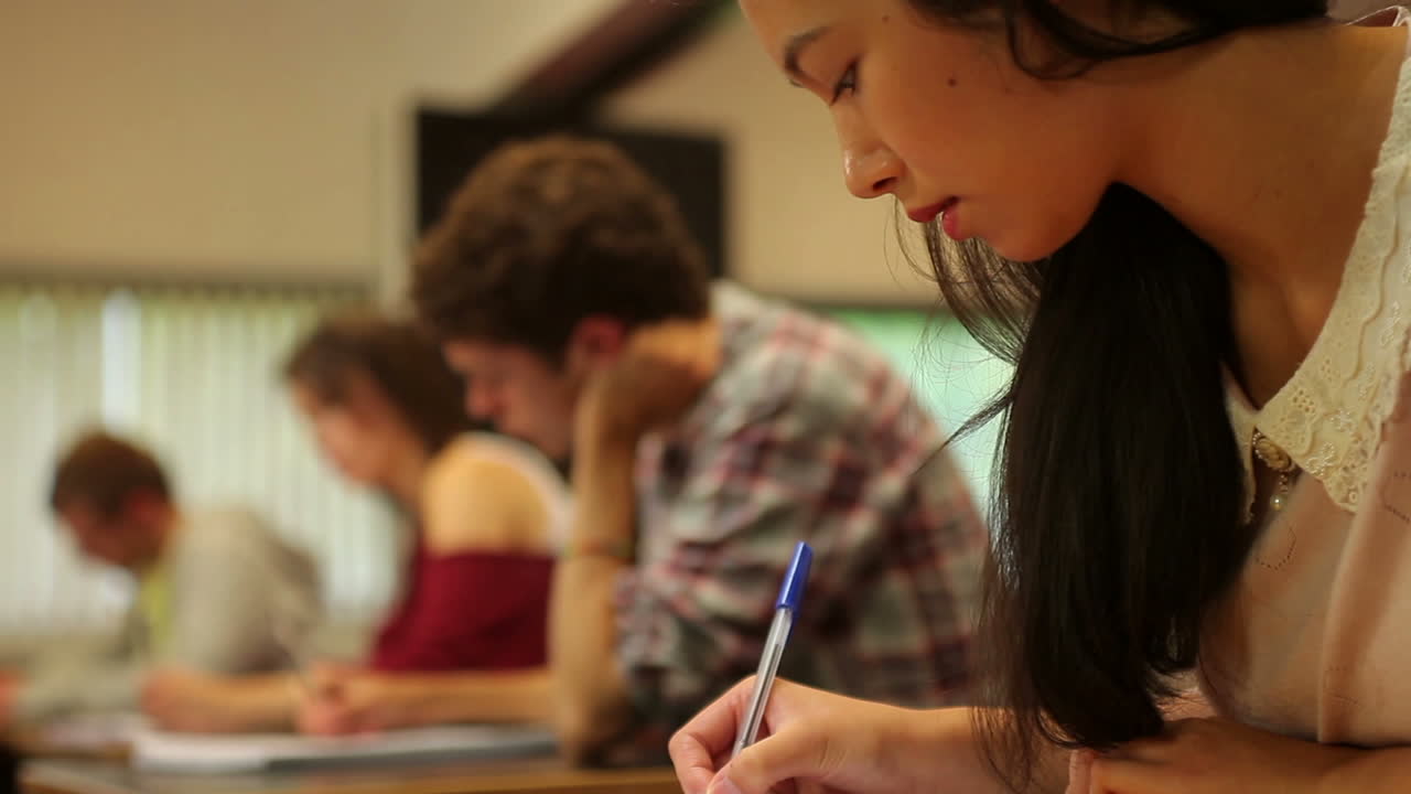 Concentrating students having an exam in a classroom