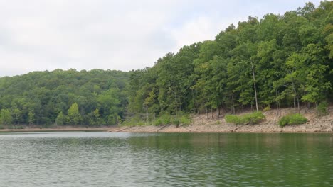 POV-while-moving-along-the-shore-of-Table-Rock-Lake-in-Missouri