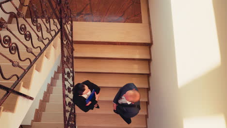 top view of businesswoman greeting meeting man colleague