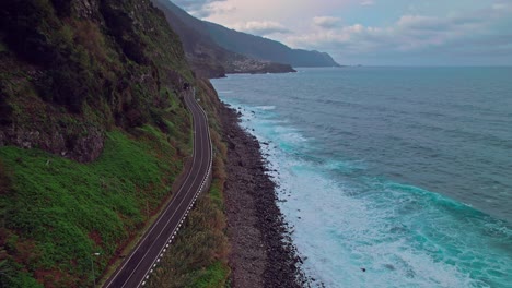 drone flying fast on the north side of madeira island, tilting into the horizon