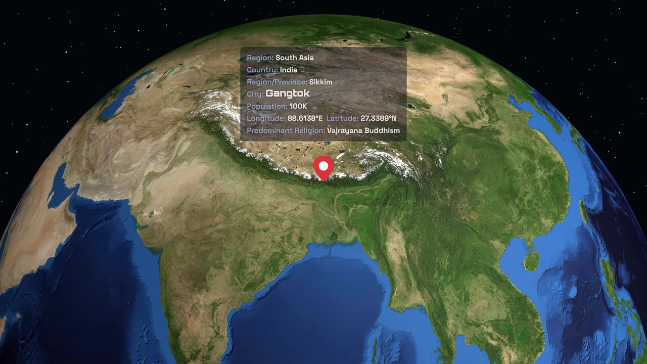 Digital globe rotates and zooms into South Asia, highlighting Gangtok with a red location pin