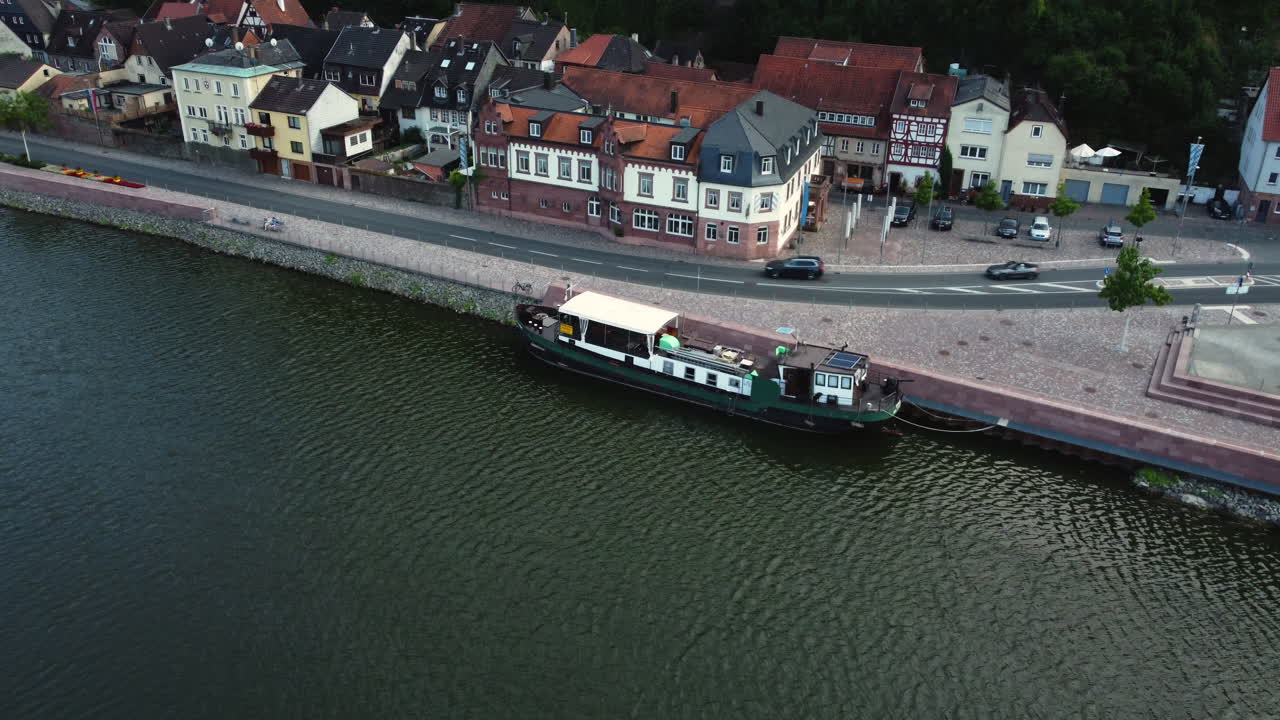 Aerial View of a River Town with a Boat