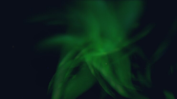 A mesmerizing green swirling vortex with a luminous center, suggestive of a mystical or supernatural presence, captured in a captivating image