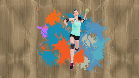 animation of caucasian female handball player holding ball over colorful stains