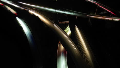 aerial night timelapse of cars driving on overlapping highways, zurich, switzerland