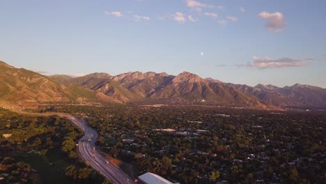 4k drone timelapse over the top of utah suburbs and highway