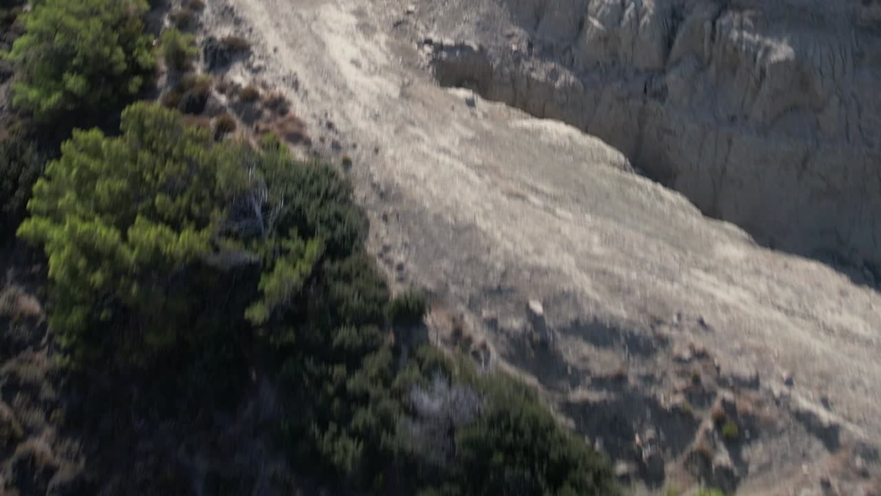 Scenic aerial view of lush greenery in Greece's rugged terrain