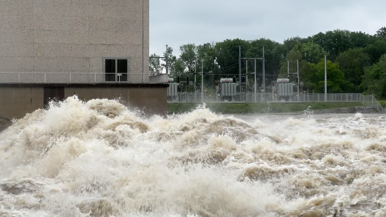 River Donau near peak level, during flood in bavaria, riwer power plant bergheim near ingolstadt