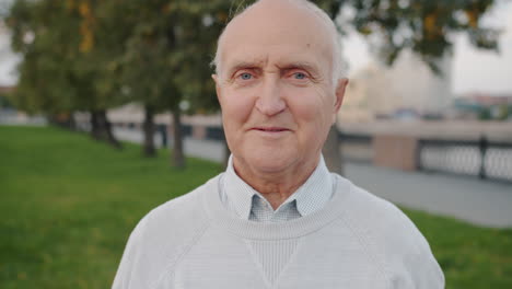 portrait of a senior man in a park