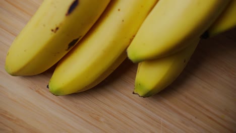 a close up shot of the ends of a bunch of bananas