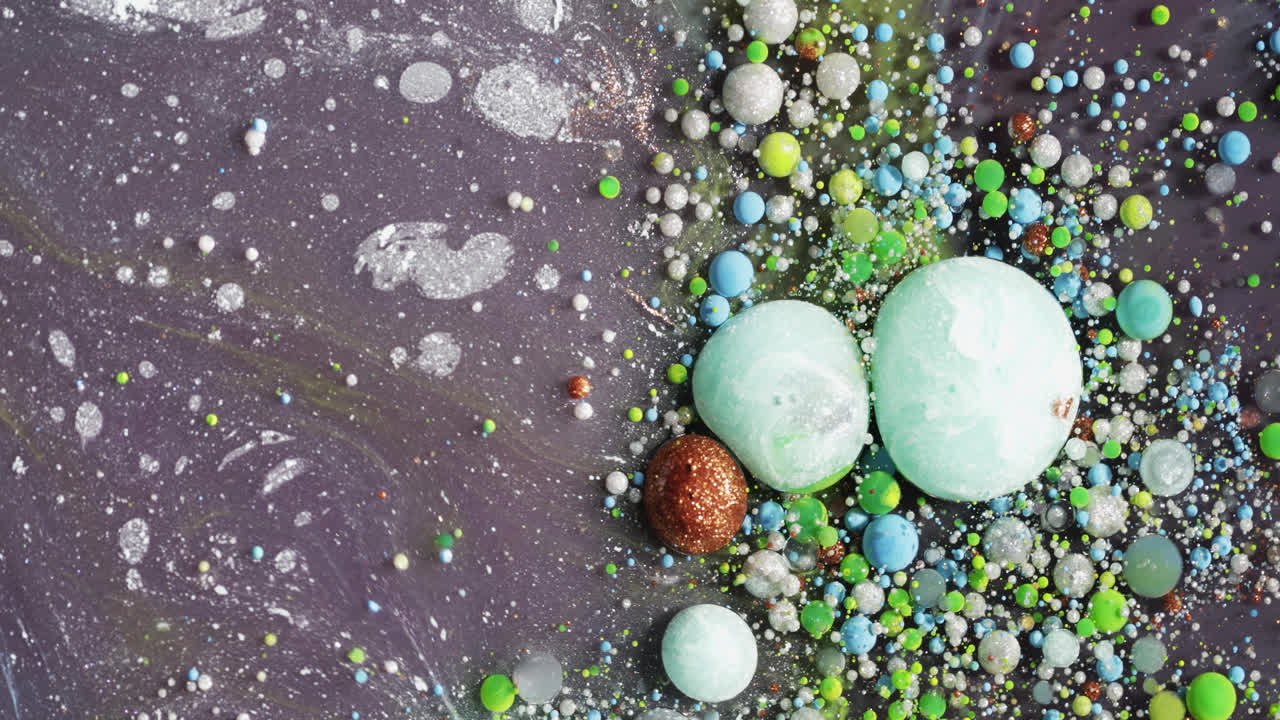 colorido arte fluido abstracto acrílico líquido macro burbuja estalla en agua con efecto de flujo de partículas de tinta de mármol psicodélico