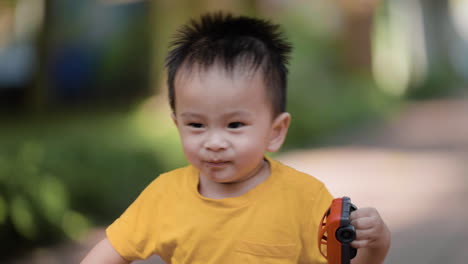 young kid and father at the park