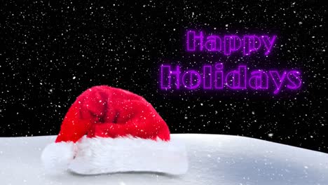 Animation-of-happy-holidays-text-over-santa-claus-hat-and-snow-falling-at-christmas