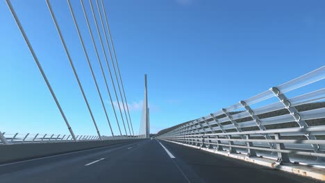 cable-stayed bridge overlooking highway