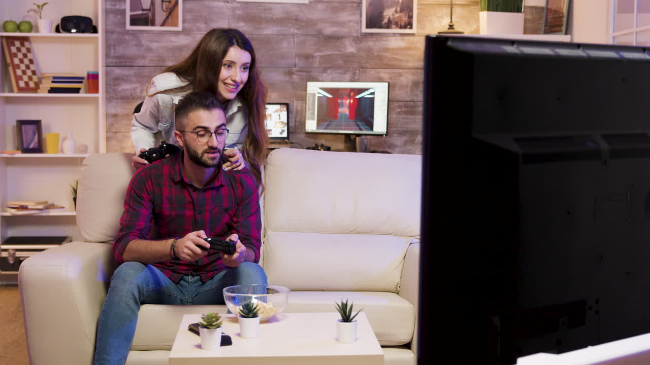 Couple Enjoying Video Games at Home