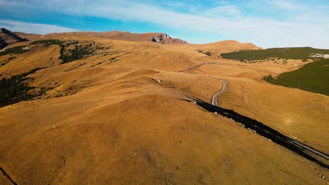 drone fly above scenic landscape in romania mountains tourist destination for trekking and hiking pietra arsa