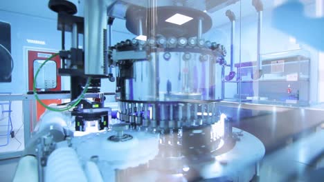 pharmaceutical manufacturing line. medical vials at production line