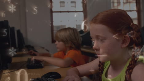 Animation of multiple numbers and symbols falling over caucasian girl using computer at school