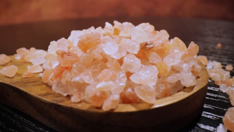 Himalayan-pink-salt-in-a-wooden-is-used-to-flavor-food.-Due-mainly-to-marketing-costs,-pink-Himalayan-salt-is-up-to-twenty-times-more-expensive-than-table-or-sea-salt.