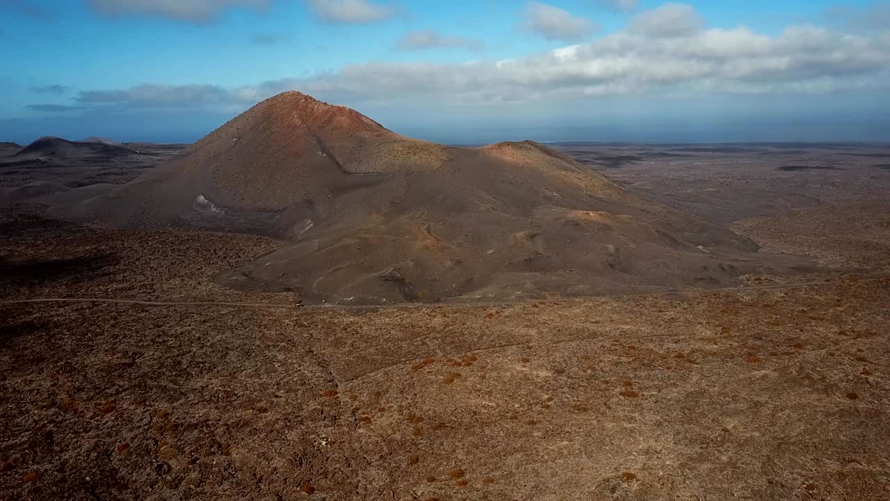 Flying around volcano near Timanfaya National Park, Lanzarote, Canary islands, Spain