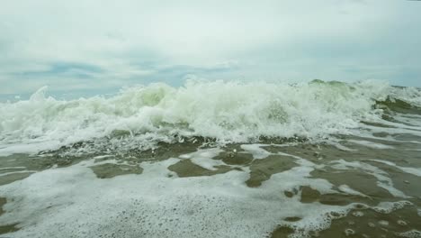 Impressive-wave-catching-the-camera,-played-backwards