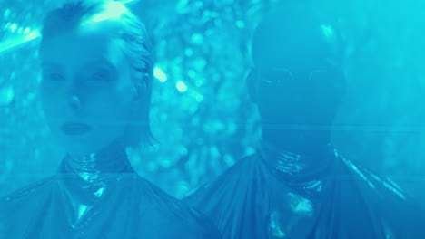 alien man and woman in laser light