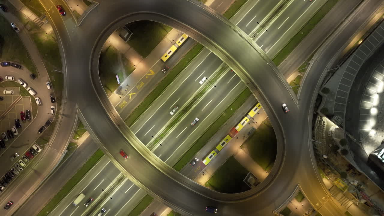 Aerial View of a Busy Highway Interchange at Night