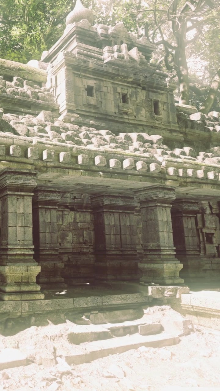 Ancient temple ruins surrounded by lush greenery evoke a sense of mystery